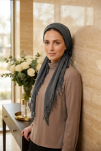 Load image into Gallery viewer, Mannequin head wearing a gray scarf with fringe details on a white background