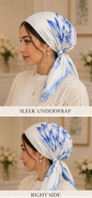 Load image into Gallery viewer, A woman modeling a light blue and white floral silk scarf headwrap in multiple views, including front, side, back, and wrapped styles, with text labels on a warm beige background.
