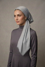 Load image into Gallery viewer, A metallic silver scarf tied in a knot, displayed against a plain white background.
