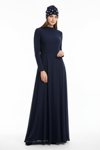 Load image into Gallery viewer, Model in skirt wearing navy pearl beanie
